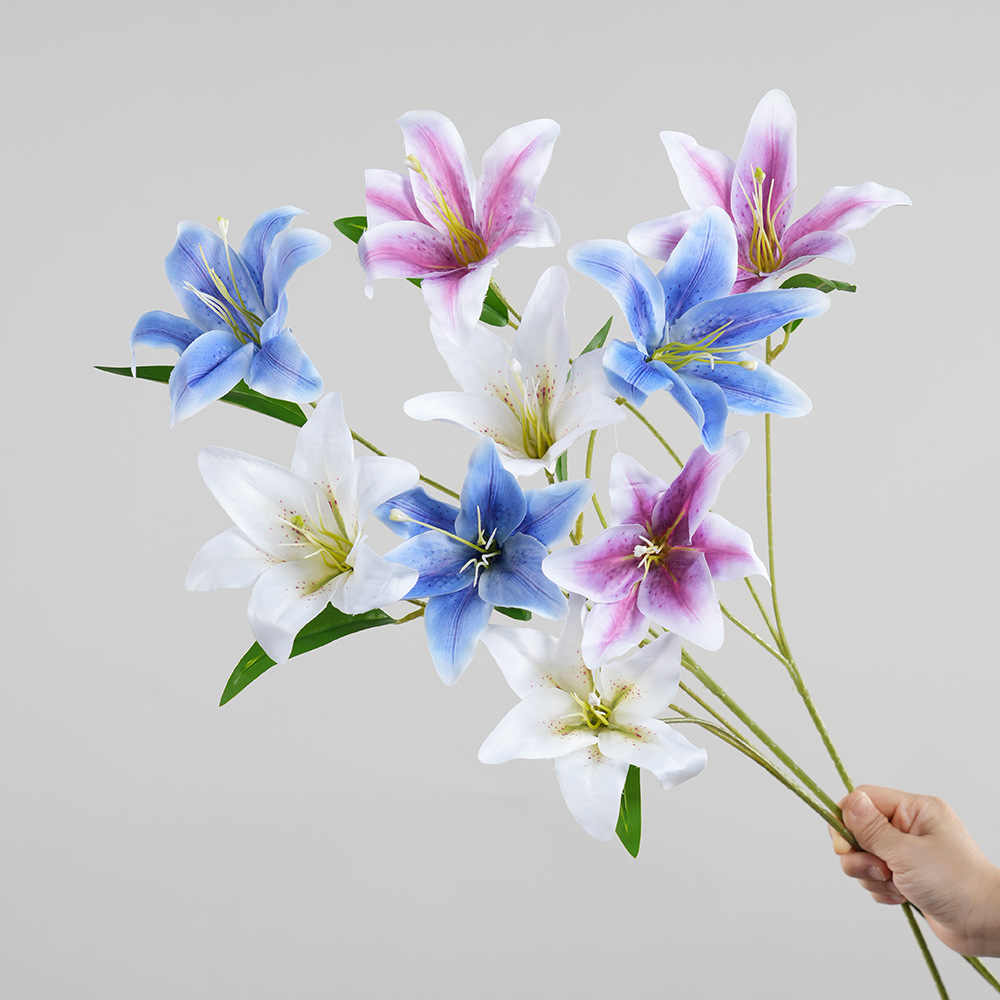 A sculptural arrangement of artificial lilies