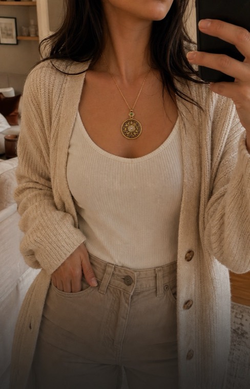 Luck Comes pendant necklace in a mirror outfit moment