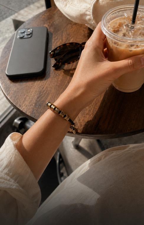 Luck Comes bracelet in a coffee run moment